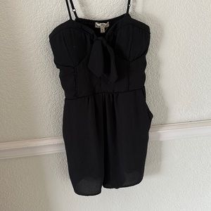 Black sexy romper with pockets and cut out